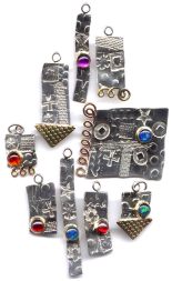 Asymmetrical metal range of jewellery