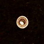 Close up showing hole lined with silver